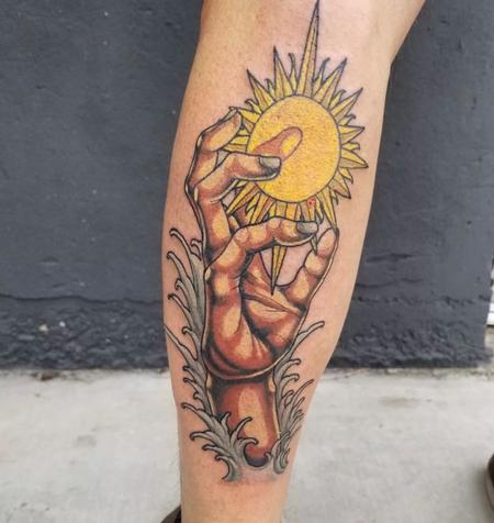 tattoos/ - Cody Cook Hand and Sun - 144521